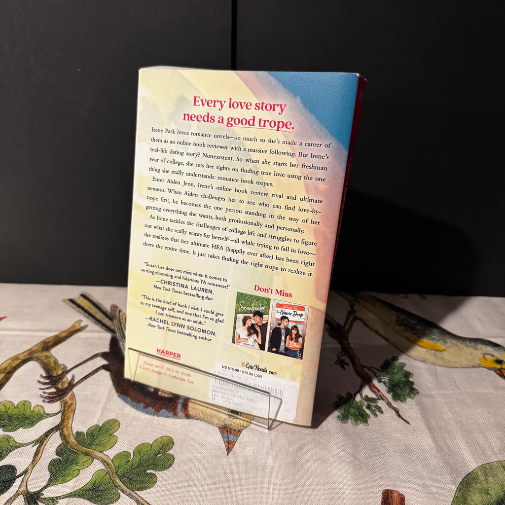 Book with a promotional message on a decorative surface