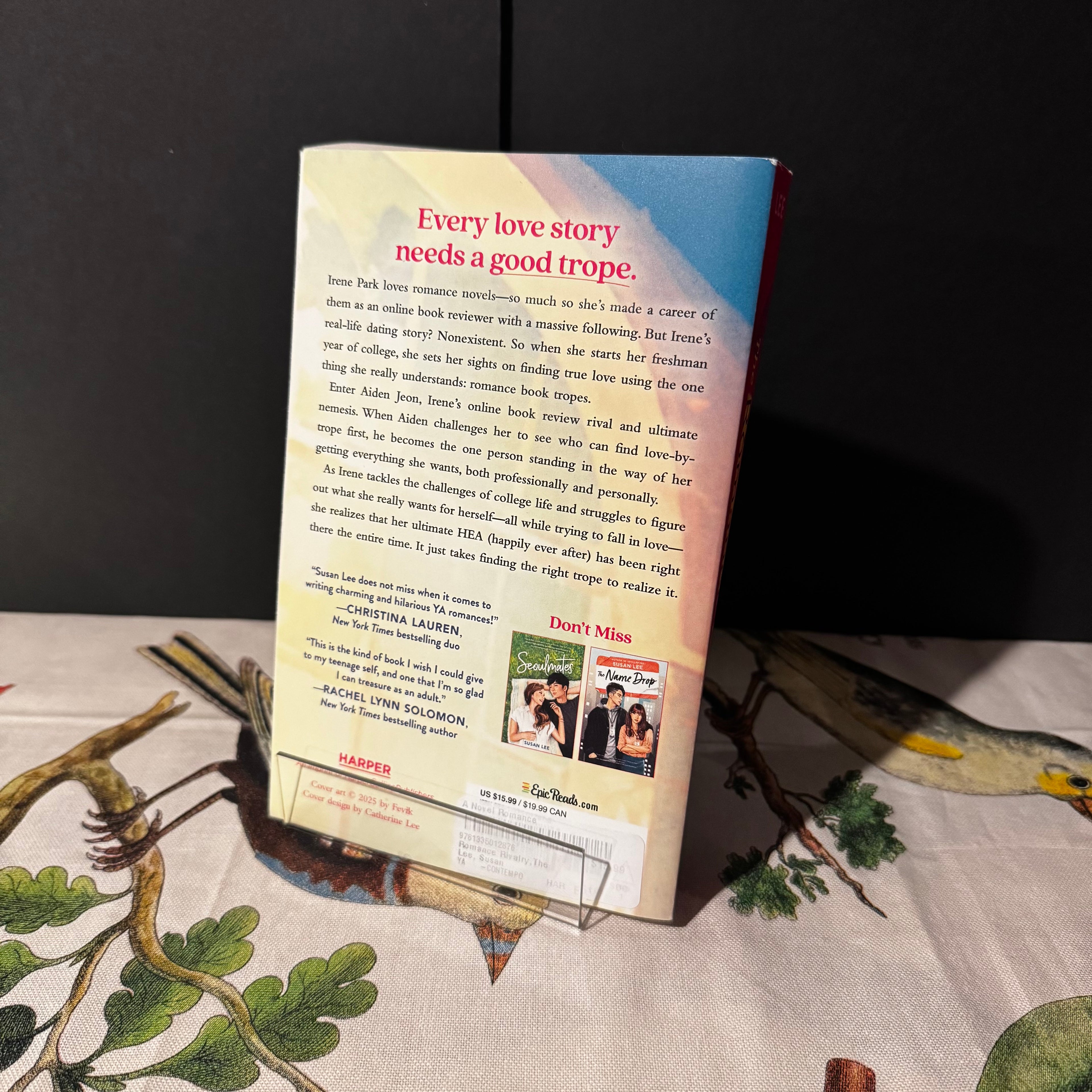 Book with a promotional message on a decorative surface