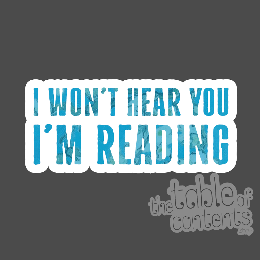 Sticker with text 'I won't hear you I'm reading' on a dark background