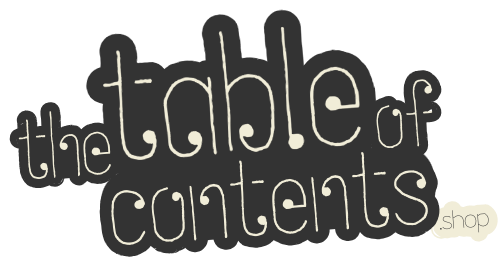 Logo for 'the table of contents shop' with stylized text on a white background