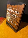 Book titled 'Indigenous Continent' by Pekka Hamalainen on a textured surface